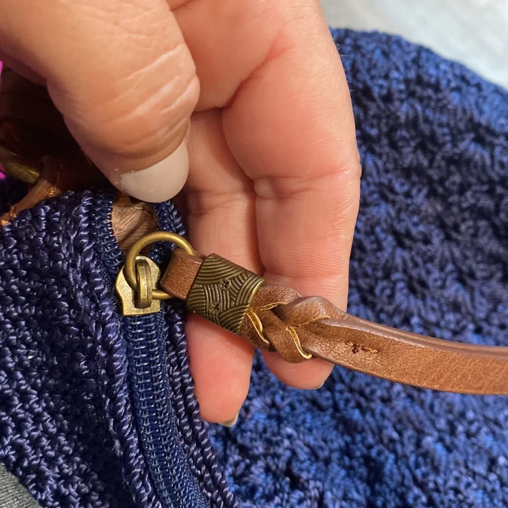 The Sak Navy Crochet Shoulder Bag with Brown Leather Straps
